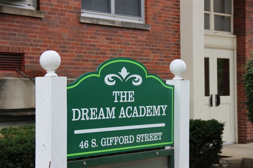  Exterior of Dream Academy and its sign 